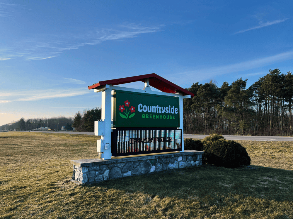 The new countryside Greenhouse road sign