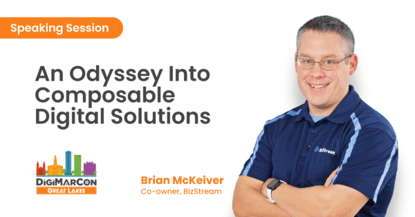 Photo of man with arms crossed, smiling at camera on white background with dark grey text reading "An Odyssey into Composable Digital Solutions"