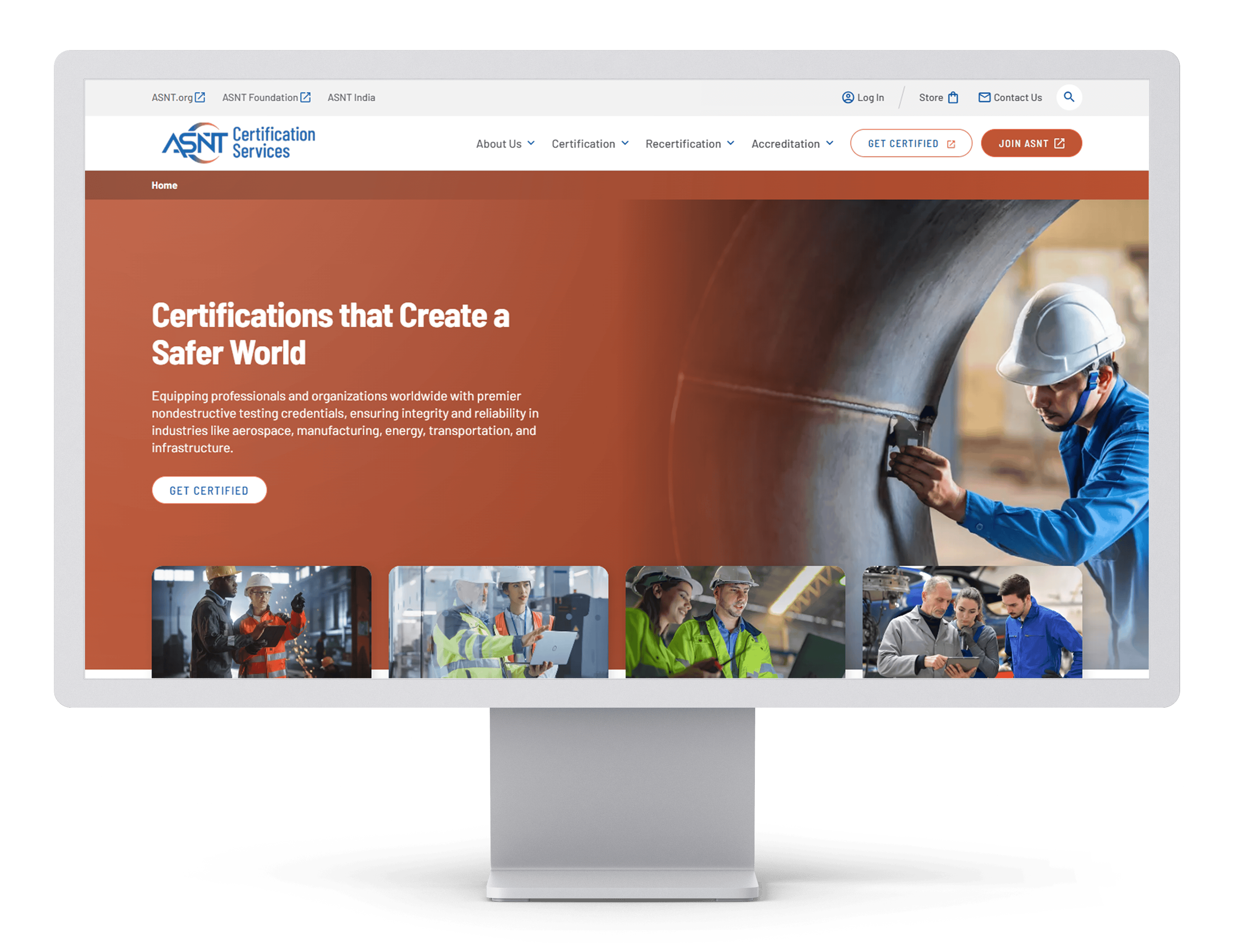 Desktop monitor displaying the ASNT Certification Services website homepage, featuring the headline "Certifications that Create a Safer World" with sections promoting certification, recertification, employer-based certification, and authorized training organizations. An image of a professional conducting a nondestructive test on industrial equipment is displayed prominently.