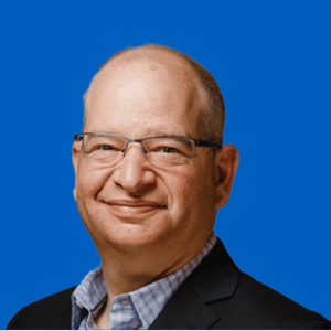 Rob Bean, team member of BizStream, smiling in a professional headshot with a bright blue background.